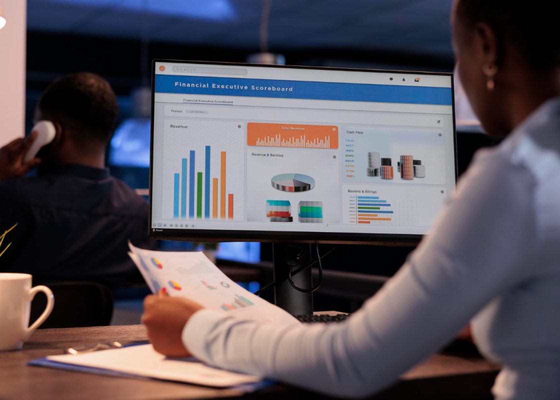 Office Employee Analyzing Business Charts Computer Documents Looking Online Research Data Create Presentation Working With Information Report Statistics Pc.jpg