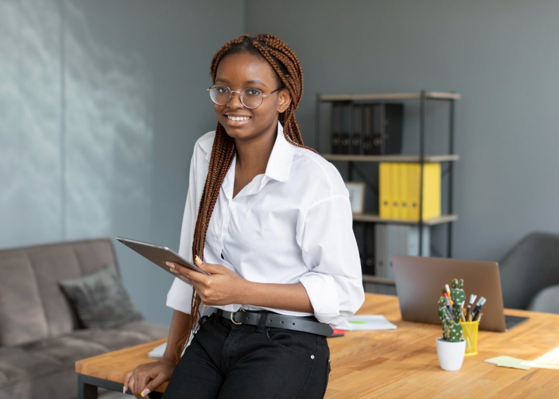 Young Woman Holding Tablet Work
