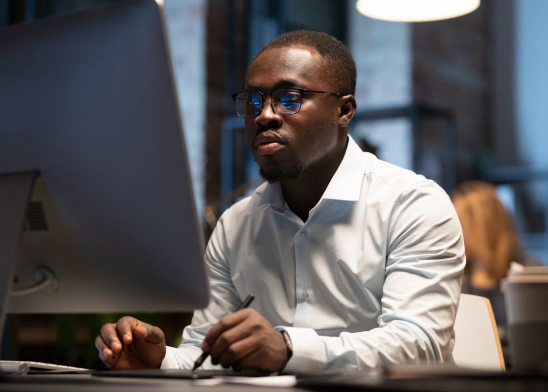 Black Man Working With Computer
