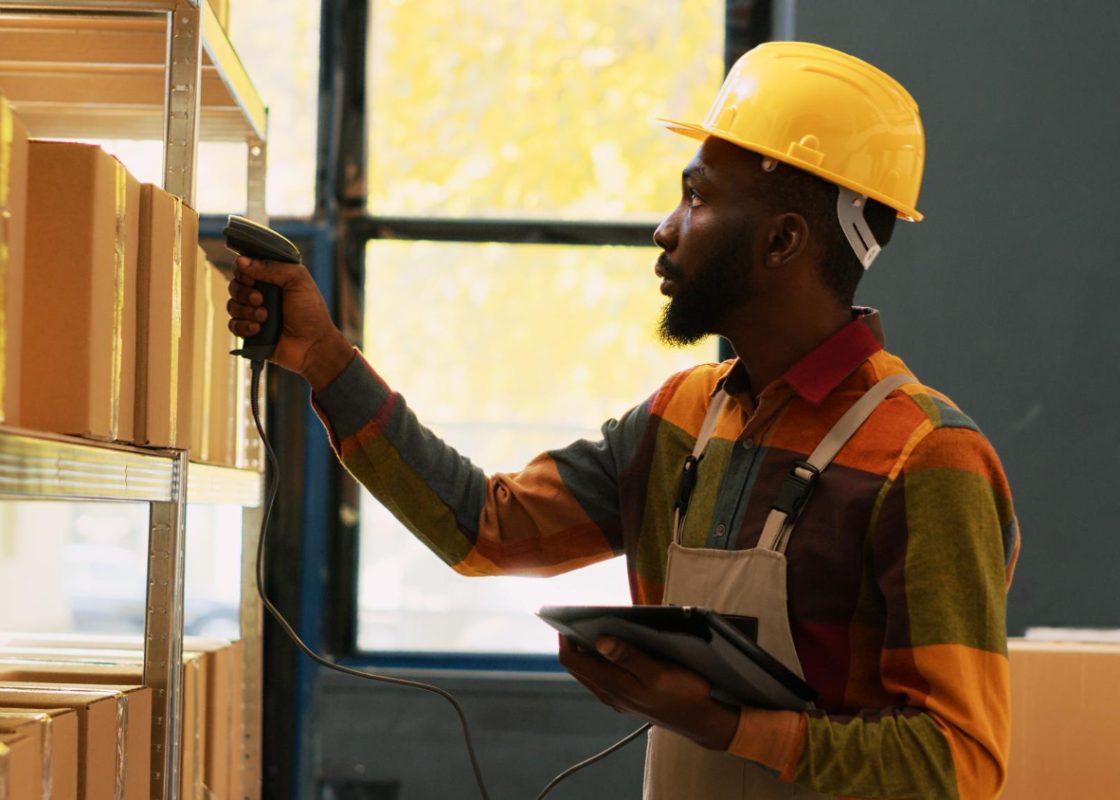 Depot Worker Scanning Cargo Stock With Retail Store Scanner Checking Order Shipment With Tablet Warehouse Employee Preparing Distribution Working Manufacturing Industry Handheld Shot
