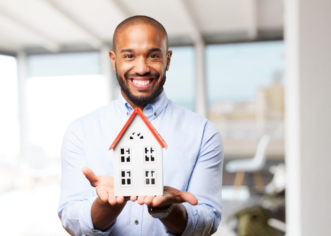 Happy Man With House