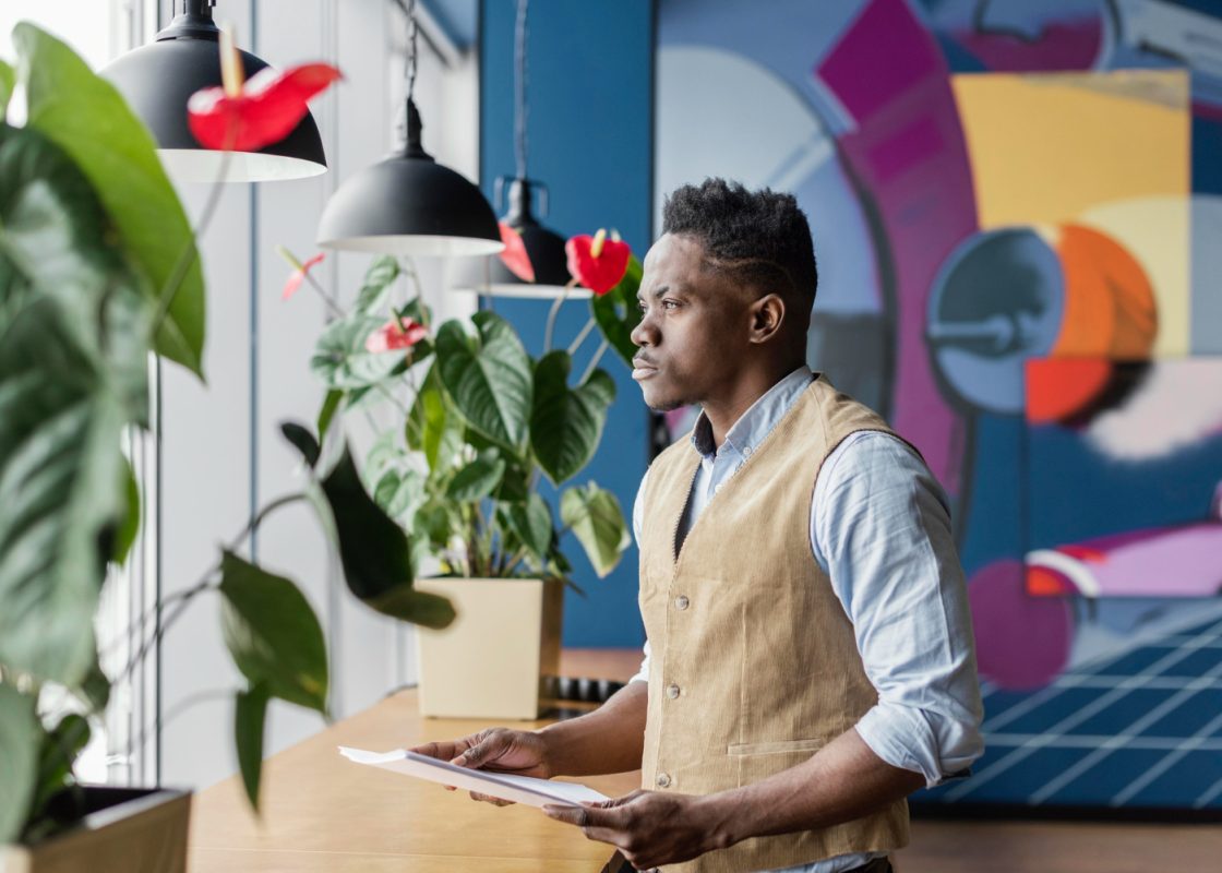 Side View Man Holding Papers Workplace